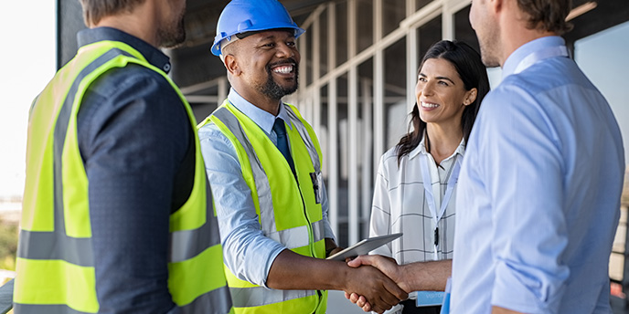 Couple Meeting With Two Contractors